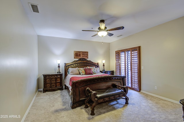 carpeted bedroom featuring visible vents, a ceiling fan, and baseboards