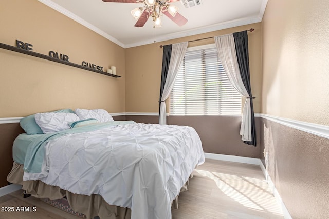 9225 W Clara Ln, Peoria, AZ 85382 - bedroom featuring crown molding, light wood finished floors, baseboards, and visible vents