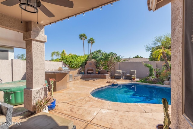9225 W Clara Ln, Peoria, AZ 85382 - view of swimming pool featuring an outdoor kitchen, a fenced backyard, a fenced in pool, and a patio area