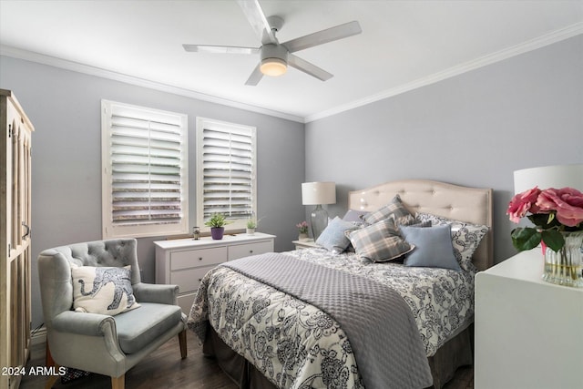 bedroom featuring ceiling fan, wood-type flooring, and crown molding