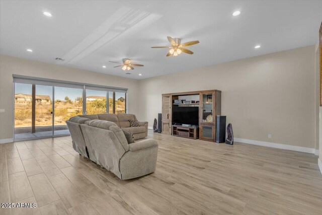 28319 N Marchant Trce, Queen Creek, AZ 85144 - living room with a ceiling fan, baseboards, light wood finished floors, and recessed lighting