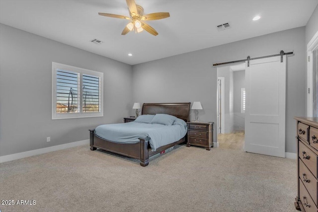 28319 N Marchant Trce, Queen Creek, AZ 85144 - carpeted bedroom featuring recessed lighting, baseboards, a barn door, and visible vents