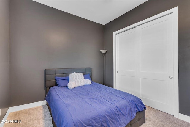 28319 N Marchant Trce, Queen Creek, AZ 85144 - bedroom featuring a closet, carpet, and baseboards