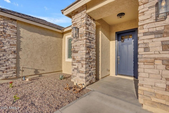 28319 N Marchant Trce, Queen Creek, AZ 85144 - view of exterior entry with stucco siding and stone siding