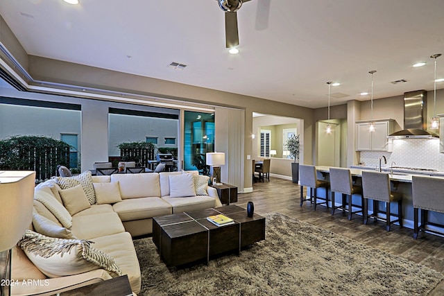 living room with dark hardwood / wood-style floors