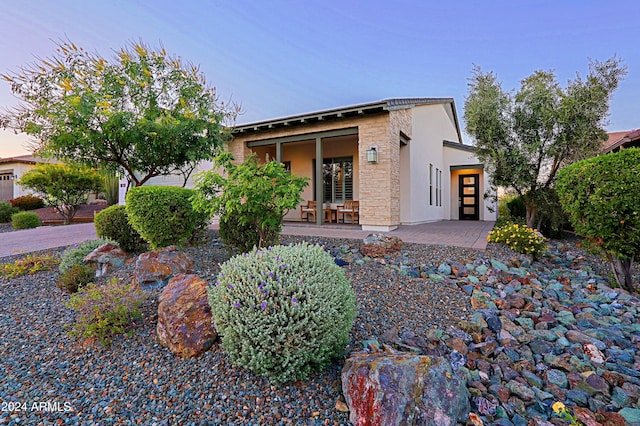 view of front of property with a patio