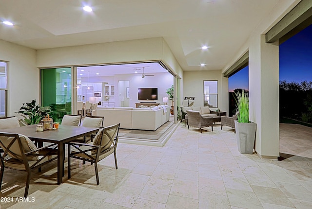 dining space featuring ceiling fan