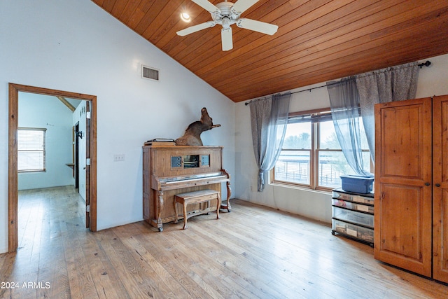 misc room with ceiling fan, high vaulted ceiling, wood ceiling, and light wood-type flooring