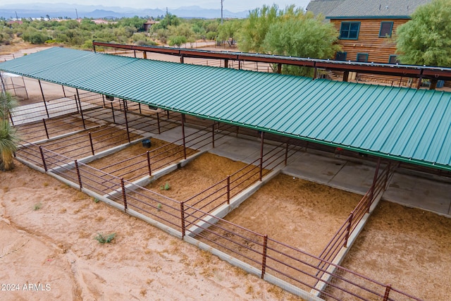 view of stable featuring a mountain view