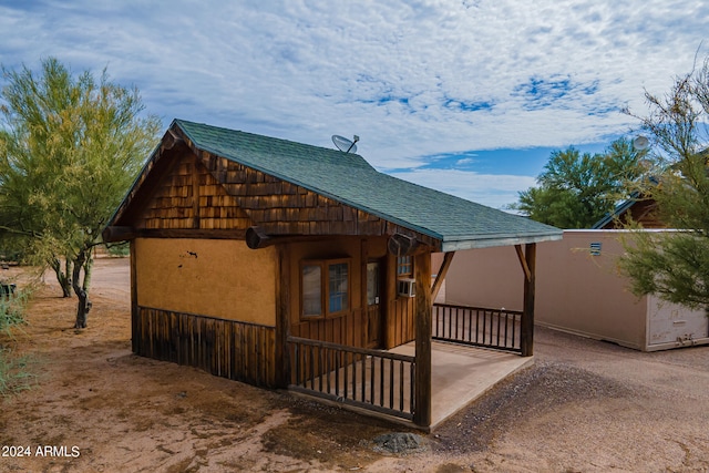 view of home's exterior featuring cooling unit