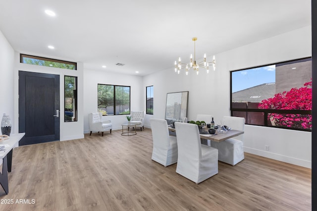 10646 E Butherus Dr, Scottsdale, AZ 85255 - dining space featuring a chandelier, light wood-type flooring, recessed lighting, and baseboards