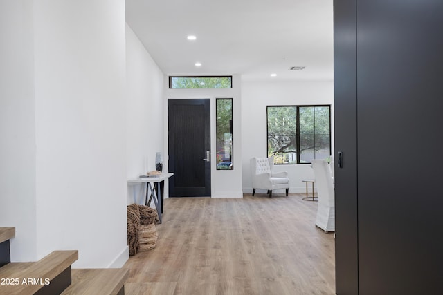 10646 E Butherus Dr, Scottsdale, AZ 85255 - foyer featuring recessed lighting, light wood-style floors, and baseboards