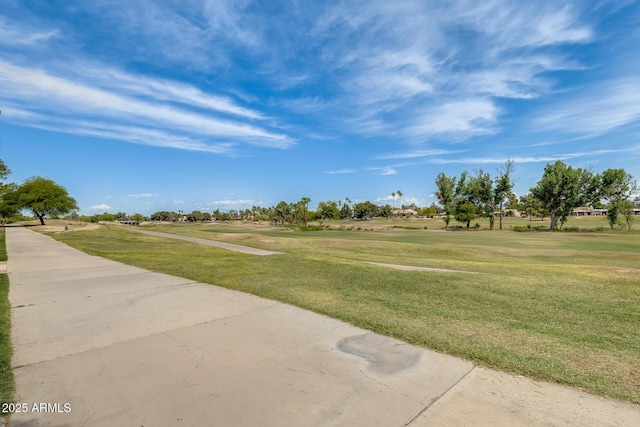 4850 E Desert Cove Ave Unit 240, Scottsdale, AZ 85254 - surrounding community with a lawn and view of golf course