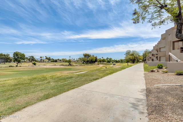 4850 E Desert Cove Ave Unit 240, Scottsdale, AZ 85254 - surrounding community featuring golf course view and a yard