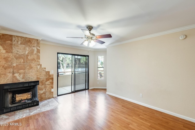 4850 E Desert Cove Ave Unit 240, Scottsdale, AZ 85254 - unfurnished living room with baseboards, ceiling fan, ornamental molding, and wood finished floors