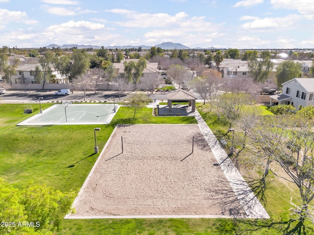 birds eye view of property with a mountain view and a residential view