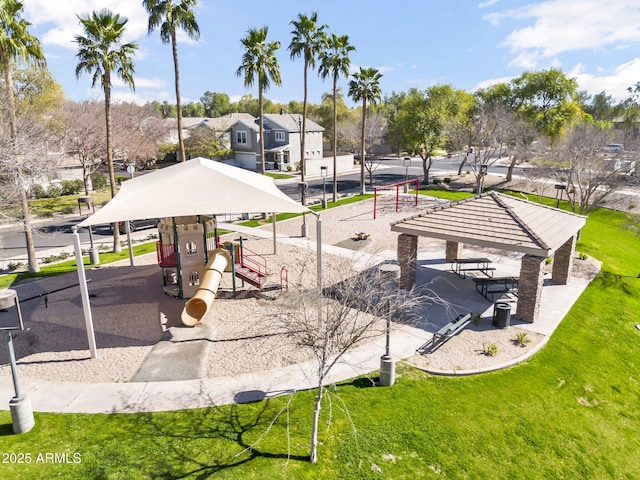 view of home's community featuring playground community, a yard, and a gazebo