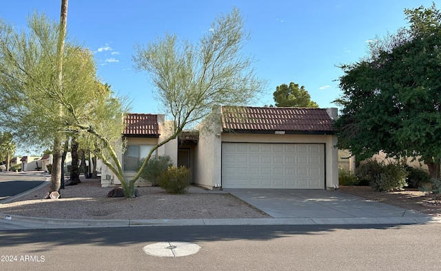 view of front of home with a garage