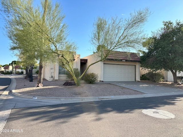 view of front of property featuring a garage