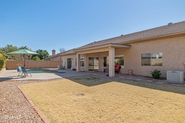 4936 E Villa Rita Dr, Scottsdale, AZ 85254 - back of house featuring a patio, central AC, a fenced backyard, and stucco siding