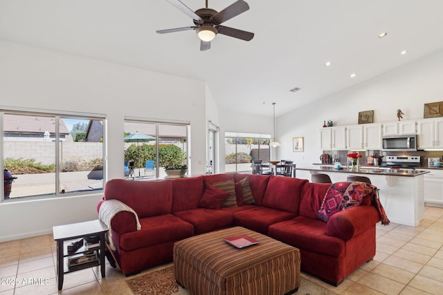 4936 E Villa Rita Dr, Scottsdale, AZ 85254 - living area with light tile patterned floors, recessed lighting, visible vents, a ceiling fan, and high vaulted ceiling