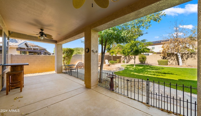 view of patio / terrace featuring ceiling fan