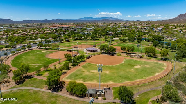 birds eye view of property with a mountain view