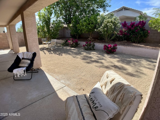 view of patio / terrace featuring outdoor dining area and a fenced backyard