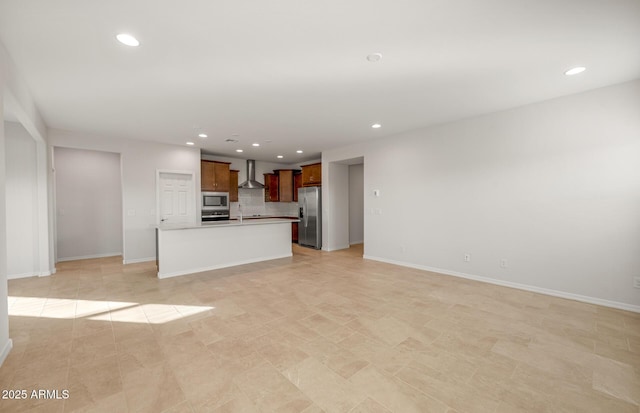 unfurnished living room with sink