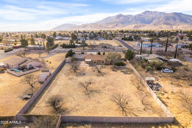 drone / aerial view featuring a mountain view