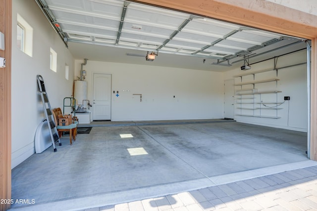 5552 N Kerwood Loop, Prescott Valley, AZ 86314 - garage with a garage door opener and gas water heater
