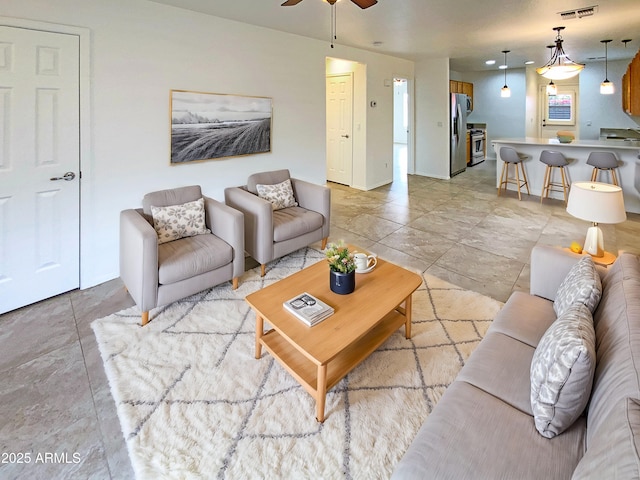 living room featuring ceiling fan