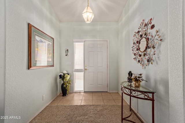 entrance foyer with light tile patterned floors