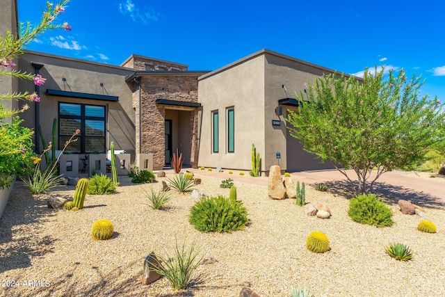 adobe home with a garage