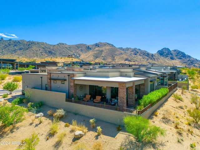 exterior space featuring a mountain view