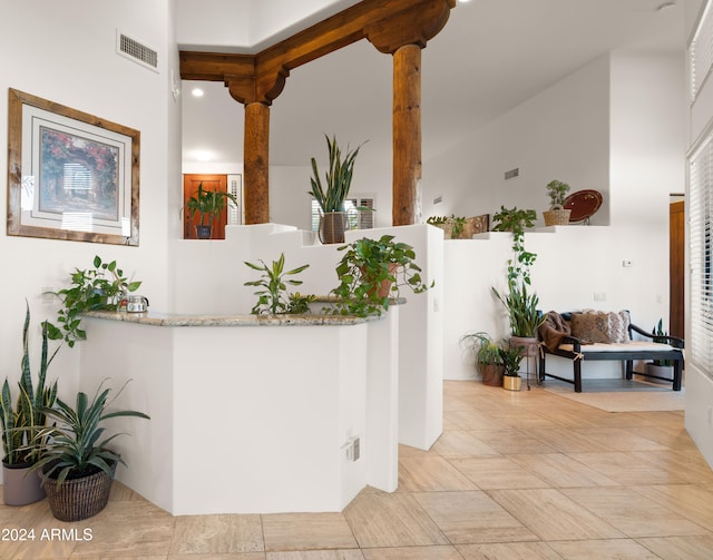 interior space featuring light tile floors