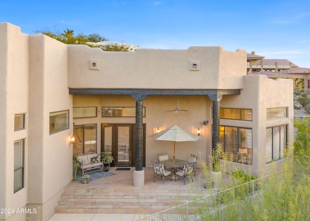 rear view of property featuring a patio