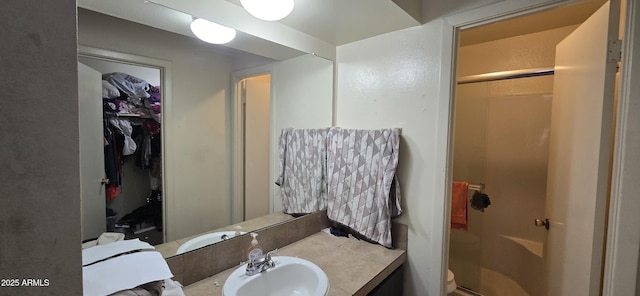 10408 W Devonshire Ave, Phoenix, AZ 85037 - full bath with a stall shower, vanity, toilet, and a walk in closet