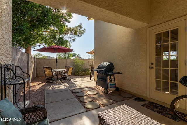 4725 E Brown Rd Unit 79, Mesa, AZ 85205 - fenced backyard with area for grilling, a patio, and outdoor dining area