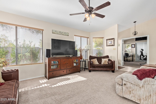 4725 E Brown Rd Unit 79, Mesa, AZ 85205 - carpeted living area with a ceiling fan and baseboards