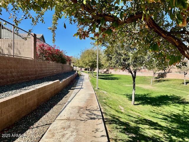 3914 E Constance Way, Phoenix, AZ 85042 - view of home's community featuring a lawn