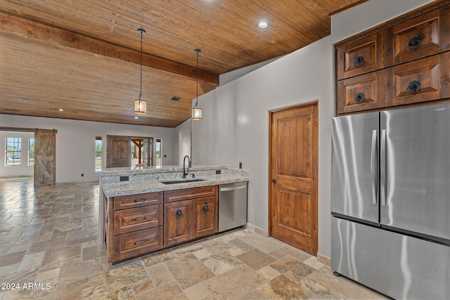 kitchen with a sink, stone tile floors, open floor plan, appliances with stainless steel finishes, and wood ceiling