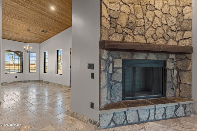 interior details featuring baseboards, recessed lighting, wooden ceiling, a fireplace, and an inviting chandelier