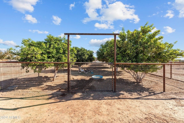 view of jungle gym featuring fence