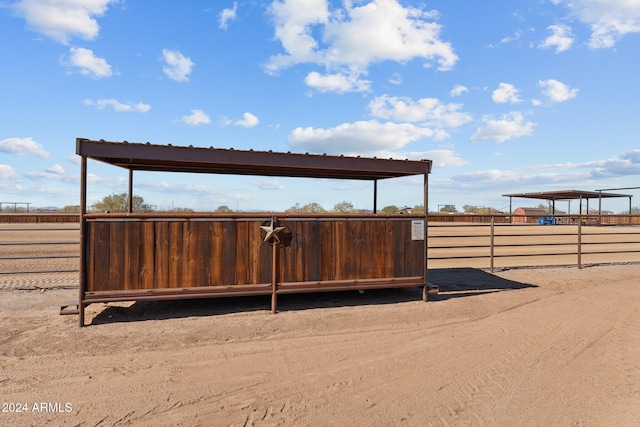 view of yard featuring an exterior structure and an outdoor structure