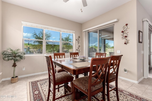 dining room featuring light tile patterned floors and ceiling fan