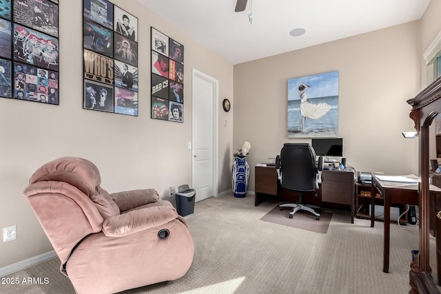 office area featuring ceiling fan and carpet