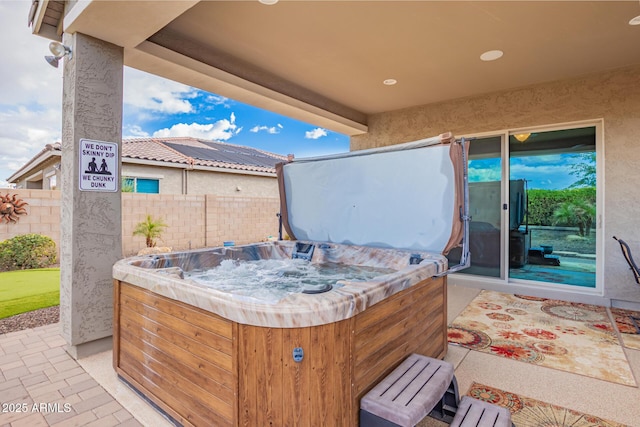 view of patio featuring a hot tub