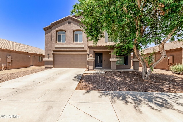 view of front of property featuring a garage