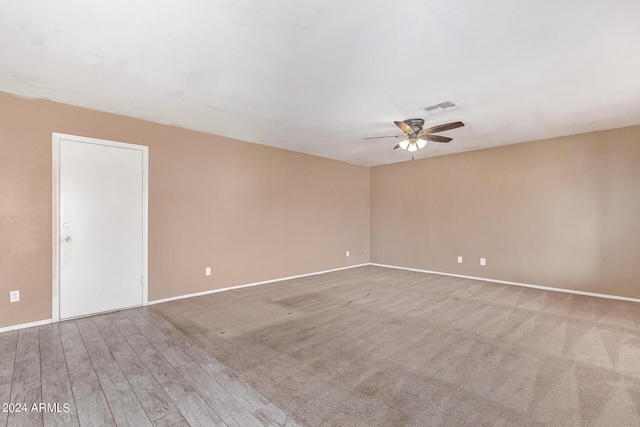 empty room featuring ceiling fan